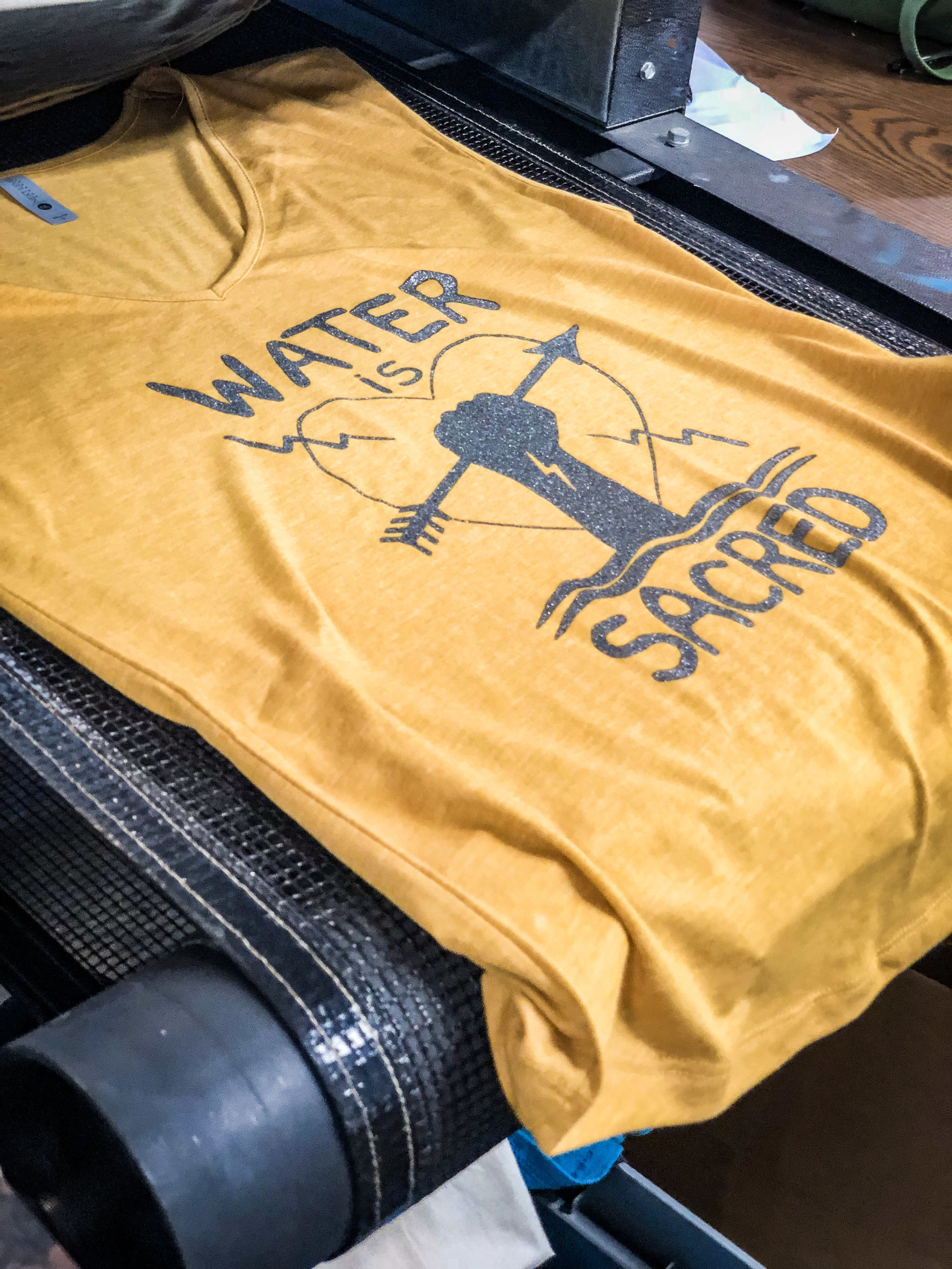 NEW! "Water is Sacred" Women's Festival Sleeveless V by Christi Belcourt