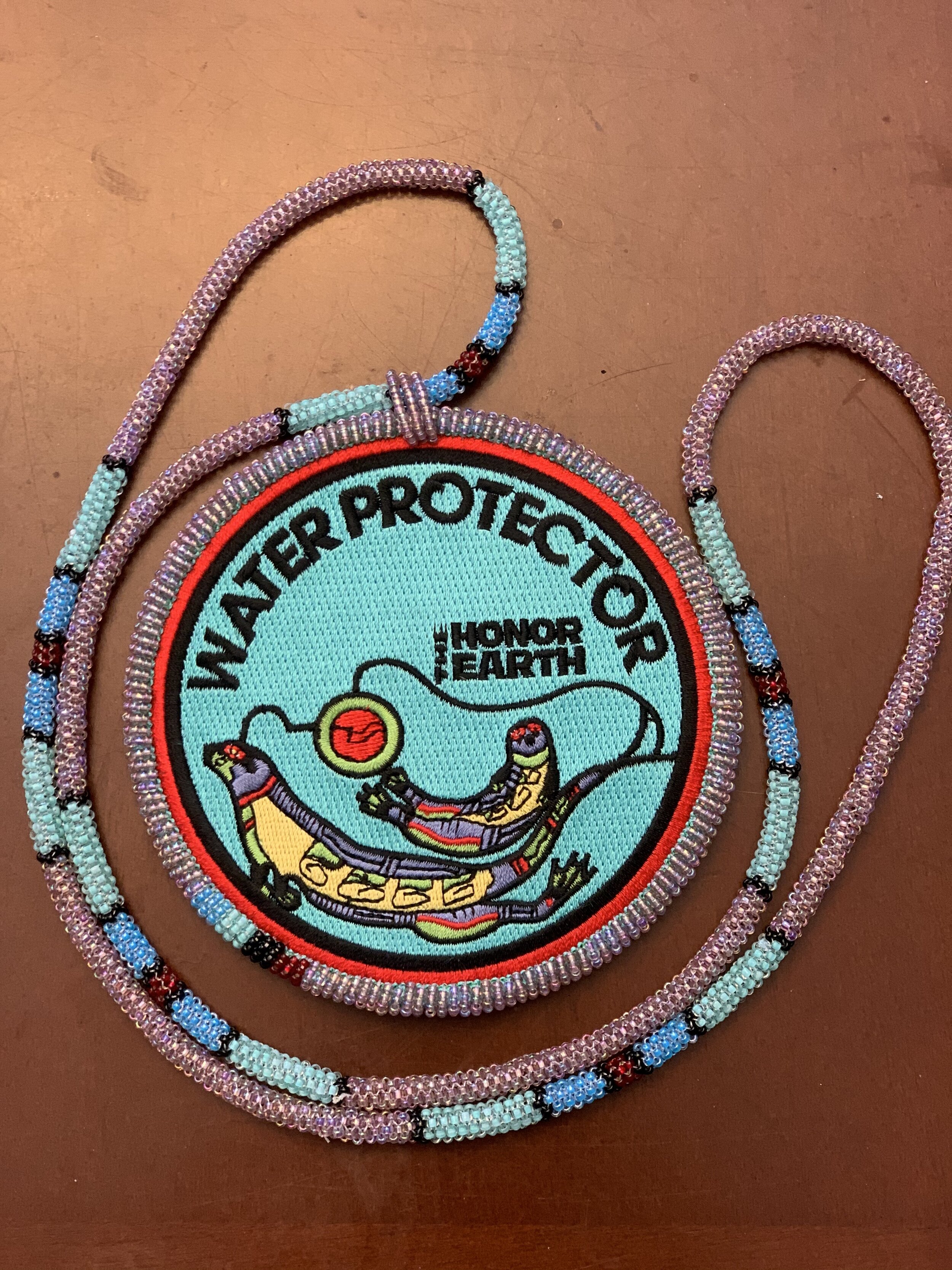 Mother Otter: Water Protector Authentic Native Custom Beaded Medallion (Purple #7)