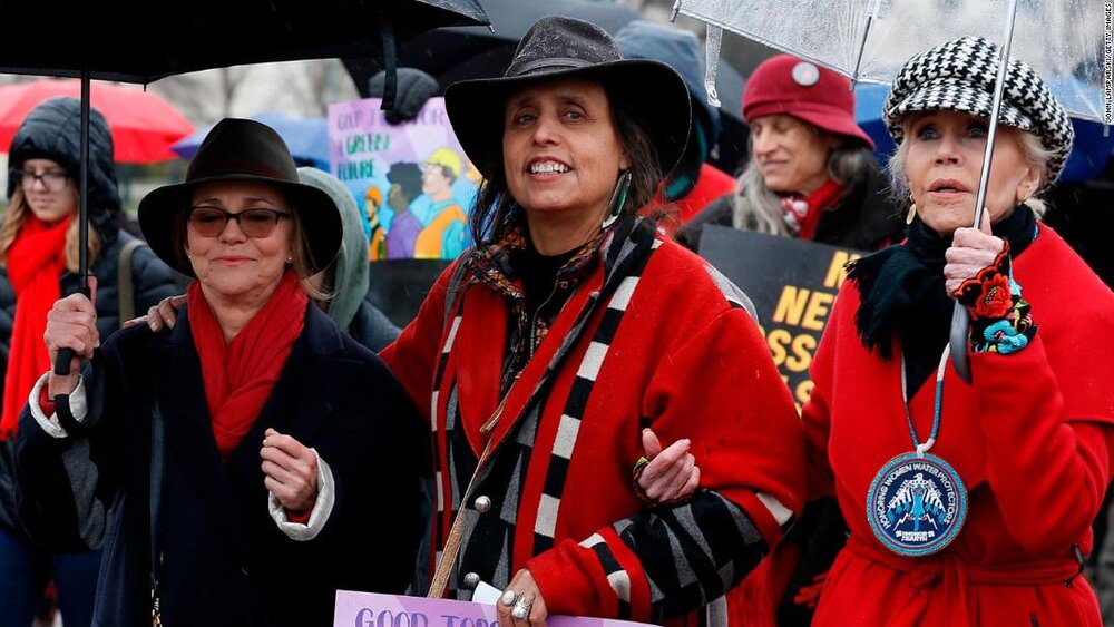 Sally Field, Winona LaDuke, and Jane Fonda in Washington DC on December 13, 2019. For the tenth straight week, Fonda has been leading  Fire Drill Fridays  to push American political leadership to address climate change. Lovely Jane is wearing one of our  Water Protector Designer Collective  pieces handed beaded by Gina Standing Cloud of the Leech Lake Band of Ojibwe designed by Sarah LittleRedfeather Design.